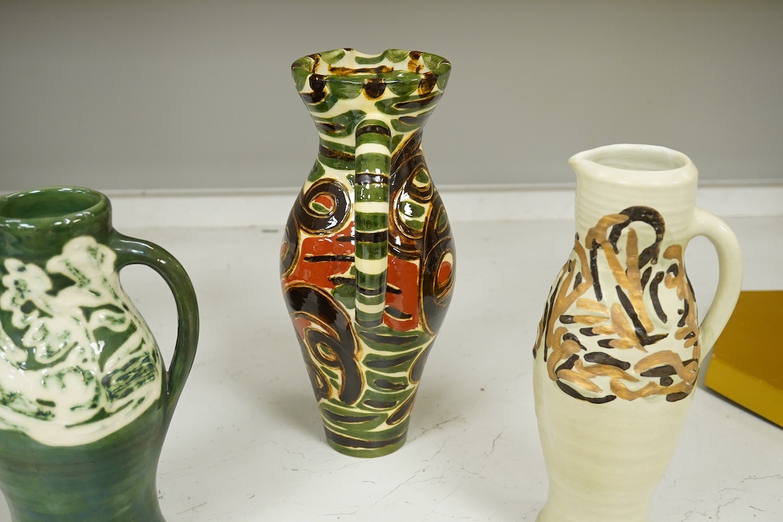 Nicola Tassie (b.1960), Three jugs and a slipware bowl, each signed to the bases, largest 28cm high